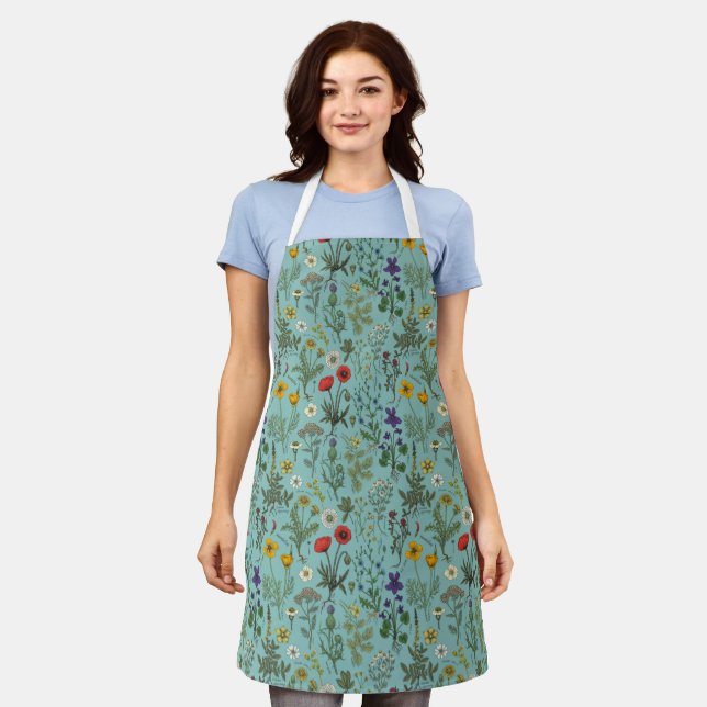 Wildflowers collage on blue apron (Worn)