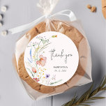 Wildflowers Girl Baby Shower Pink Classic Round Sticker<br><div class="desc">Stylish girl baby shower pink stickers feature elegant watercolor wildflowers,  thank you,  your name and shower date in chic lettering. MATCHING items in our collection.</div>