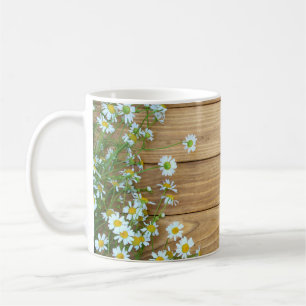 Wildflowers, herbs: wooden background. coffee mug
