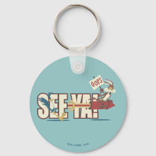 Wile E. Coyote Rocketing Past ROAD RUNNER™ Key Ring