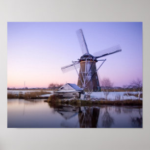 Windmill at sunrise in Holland in winter poster