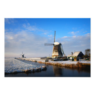 Windmill in the snow in a dutch winter landscape photo print