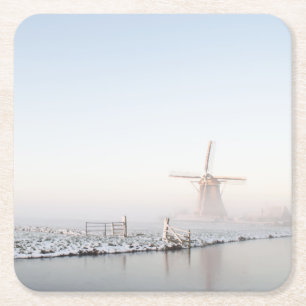 Windmill in the snow in winter coaster