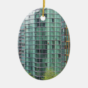 Window washers on downtown high rise building ceramic tree decoration