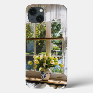 Window with lace curtain and tulips iPhone 13 case
