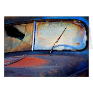 Windshield of an old rusty truck