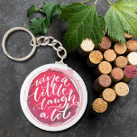 Wine a Little Laugh A Lot Key Ring<br><div class="desc">Round button keychain features fun text "Wine a Little Laugh A Lot" on a red wine stain. Keychains make memorable gifts for family and friends or create for yourself.</div>