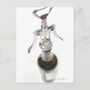 Wine bottle with corkscrew. postcard