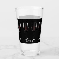 Wine glasses with red wine on black