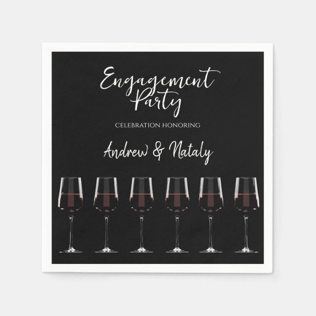 Wine glasses with red wine on black napkin (Front)