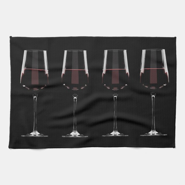 Wine glasses with red wine on black tea towel (Horizontal)