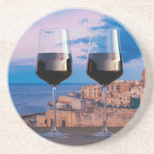 Wine glasses with view of sunset over Valletta Coaster
