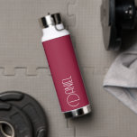 Wine Red Modern Typography Personalised Water Bottle<br><div class="desc">Trendy, vacuum insulated water bottle that features personalised name in white, modern typography on a trendy, wine red colour background. Personalise bottle by editing name and replacing name with your own as desired. Perfect for a birthday gift, wedding groomsman gift, etc. Select your water bottle style. Select your water bottle...</div>