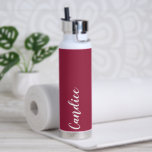 Wine Red Personalised Wedding Bridesmaid Water Bottle<br><div class="desc">Gift your wedding bridesmaid or maid of honour with this trendy, vacuum Insulated water bottle that features her name in white, stylised script on a wine red colour background designed to match your wedding colour scheme. Personalise bottle by editing and replacing name with your own as desired. Select your water...</div>