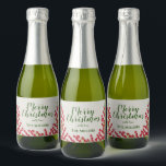 Winter Berries and Greens Christmas Mini Sparkling Wine Label<br><div class="desc">Watercolor winter berries,  leaves and snow flurries accent these mini sparkling wine bottle labels. Personalise with your names,  dates and other details in chic lettering in ANY COLOR fonts for any occasion and perfect for Christmas or winter wedding party favours.</div>