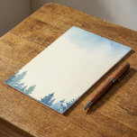 Winter blue pine trees plain notepad<br><div class="desc">This elegant note paper features a delicate hand-painted watercolor illustration of snow dusted pine trees standing tall against a soft blue winter sky. The gentle snowflakes and frosty blue evergreens create a serene and peaceful winter woodland atmosphere. Perfect for letter writing, to do lists, and seasonal notes, this design embodies...</div>