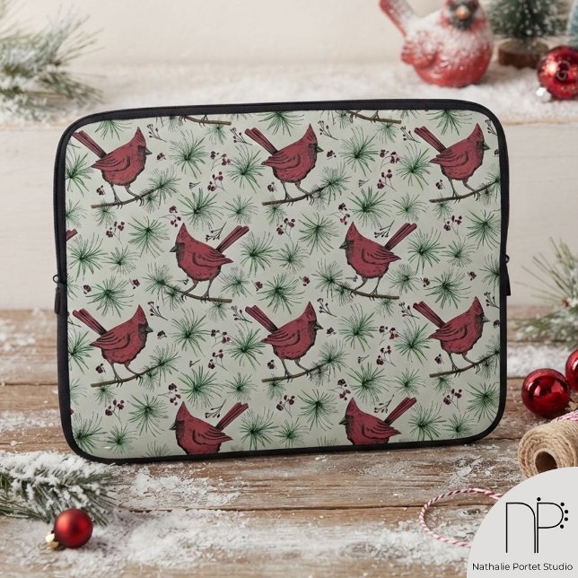 Winter Cardinal Laptop Sleeve (This winter laptop sleeve features hand-drawn cardinals on pine for elegant holiday protection.)