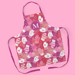 Winter Christmas Mittens Pattern in Pink Apron<br><div class="desc">This novelty pattern design features hand drawn mittens with unique doodled designs on each mitten, perfect for the chilly winter season. Each adorable mitten has snowflakes, hearts, festive stripes, strings and pom poms or petal prints, and are surrounded by snowflake dots. Coloured in a bright and lively colour palette of...</div>