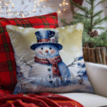 Winter Forest Snowman Christmas | Gold<br><div class="desc">Bring joy and whimsy to your seasonal decor with this charming Gold Winter Forest Holiday Throw Pillow. Featuring a smiling snowman dressed in a classic top hat and cosy scarf, the design captures the magic of a wintry scene with softly falling snow and delicate white snowflakes. Nestled among frosted trees,...</div>