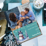 Winter Forest Snowman Christmas Photo | Teal Holiday Card<br><div class="desc">Spread smiles and seasonal cheer with this charming Teal Winter Forest Snowman Christmas Holiday Photo Card, featuring a friendly snowman in a classic top hat and scarf, surrounded by snow-covered pine trees and a peaceful winter forest backdrop. Falling snow and delicate white snowflakes add a whimsical touch, while your family...</div>
