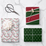 Winter Greenery Red and Green Patterns Christmas Wrapping Paper Sheet<br><div class="desc">These Christmas gift wrapping sheets feature three coordinating patterns. The first is elegant winter greenery in the colours: red,  green,  blue and tan. The second pattern is red and green diagonal stripes and the third pattern is dark green with a white dots.</div>