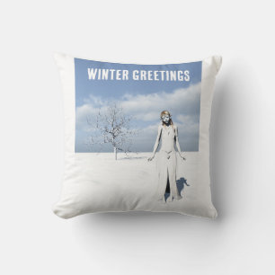 Winter Greetings. Female elf walking in the snow Cushion