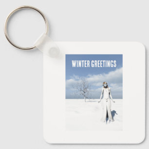 Winter Greetings. Female elf walking in the snow Key Ring