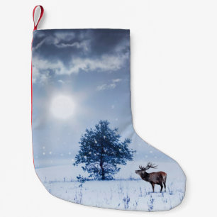 Winter landscape in blue color. Lonely tree and wi Small Christmas Stocking