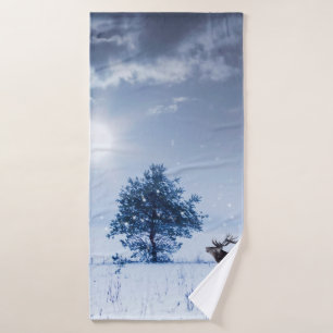 Winter landscape in blue colour. Lonely tree and w Bath Towel