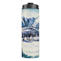 Winter landscape with mountain village covered wit