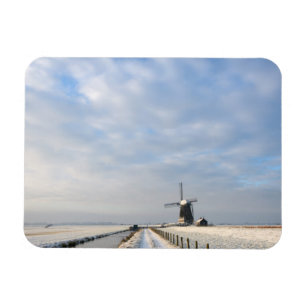 Winter landscape with snow and windmill in Holland Magnet
