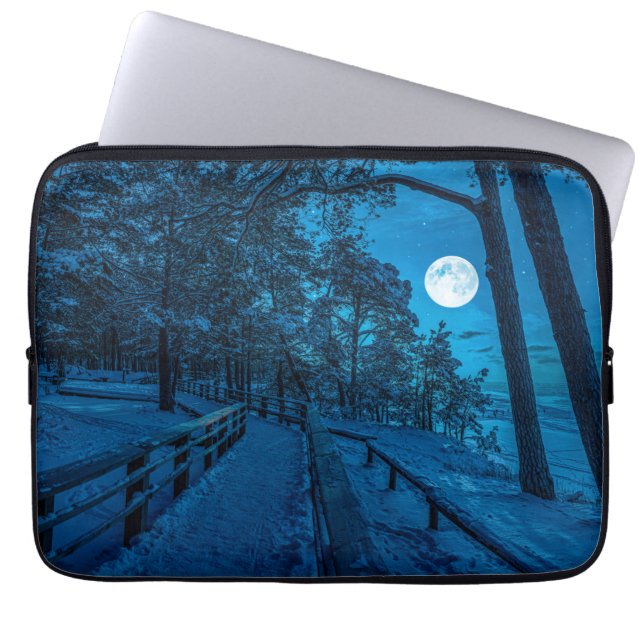 Winter landscape with snow covered pine forest laptop sleeve (Front)