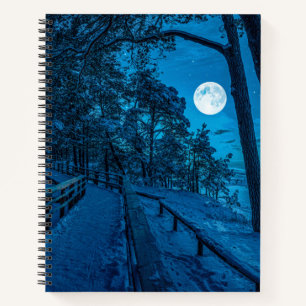 Winter landscape with snow covered pine forest notebook