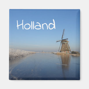 Winter landscape with windmill and ice magnet