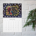Winter Night Snowflakes Photo Christmas Calendar<br><div class="desc">Capture cherished memories while counting down the days with this romantic Christmas calendar. The design evokes a magical winter night, adorned with intricate white and light blue snowflakes set against a celestial background. The front showcases a personalised family portrait, framed in elegant gold colour, offering a heartfelt touch. Above the...</div>