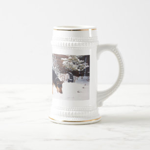 Winter snow scene with cute black and tan dog beer stein
