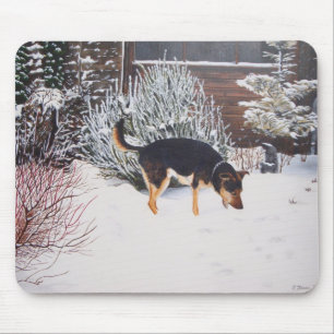 Winter snow scene with cute black and tan dog mouse pad