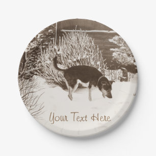 Winter snow scene with cute black and tan dog paper plate