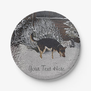 Winter snow scene with cute black and tan dog paper plate