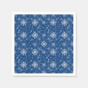 Winter snowflake pattern on blue background napkin