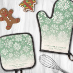 Winter Snowflakes on Green Cute Ombre Christmas Oven Mitt & Pot Holder Set<br><div class="desc">Add a touch of winter elegance to your kitchen with this beautiful oven mitt and pot holder set featuring a delicate pattern of white snowflakes on a green ombre background. Perfect for bringing festive charm to your culinary space, this set is both stylish and functional. Customise it with your name...</div>