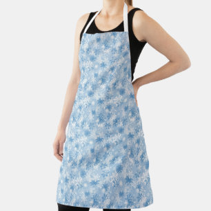 Winter snowflakes pattern on blue apron