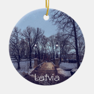 Winter snowy city park in the evening ceramic tree decoration