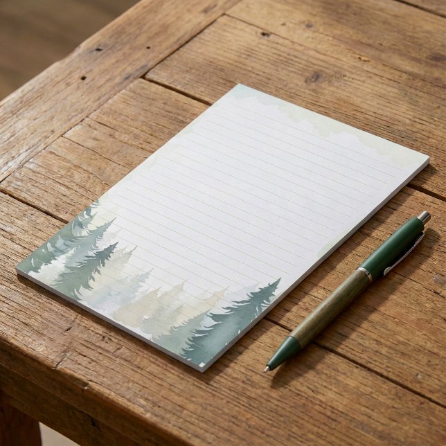 Winter themed green pine trees lined notepad (Winter themed green pine trees lined notepad.)