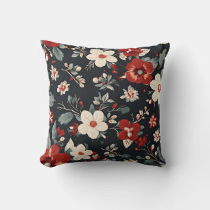 winter white and red flowers, grey blue leaves cushion