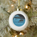 Winter Wolf - Tapetum Lucidum Ceramic Ball Christmas Ornament<br><div class="desc">A wolf walking on hard-crusted snow at night; a tree-covered peak in the background. Moonlight reflects off snow and pale bark of birch trees. The wolf's eyes also glow with reflected moonlight. Add your own text. The reflective quality of many animals eyes is due to the tapetum lucidum (Latin: "bright...</div>