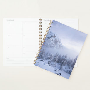 Winter wonderland, fog, spruce forest and mountain planner