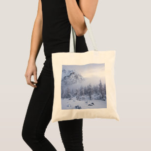 Winter wonderland, fog, spruce forest and mountain tote bag