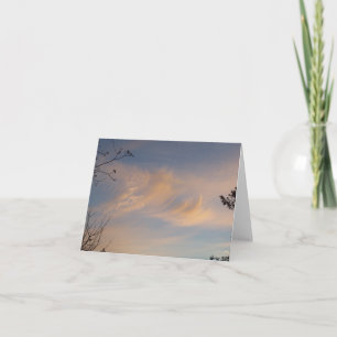 Wispy cirrus clouds on a blank note card