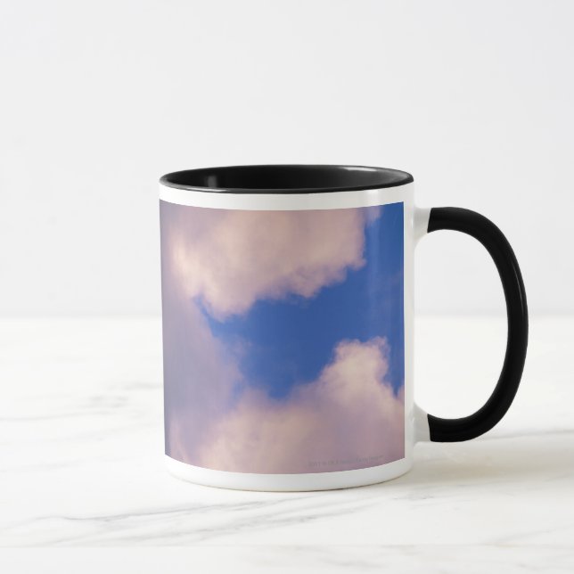 Wispy clouds against blue sky mug (Right)